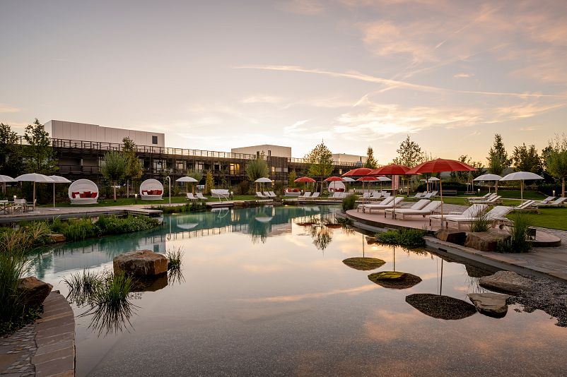 Seezeitlodge Bostalsee – Natural Swimming Pond at Sunset in Saarland